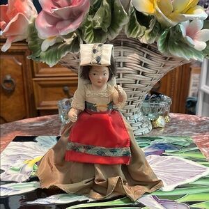 Traditional Doll with Red and Brown Dress